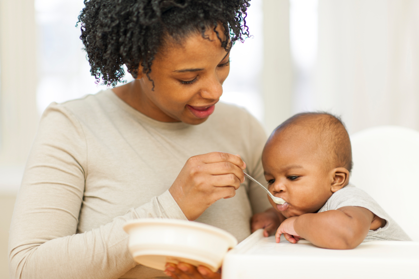 Mother feeding baby